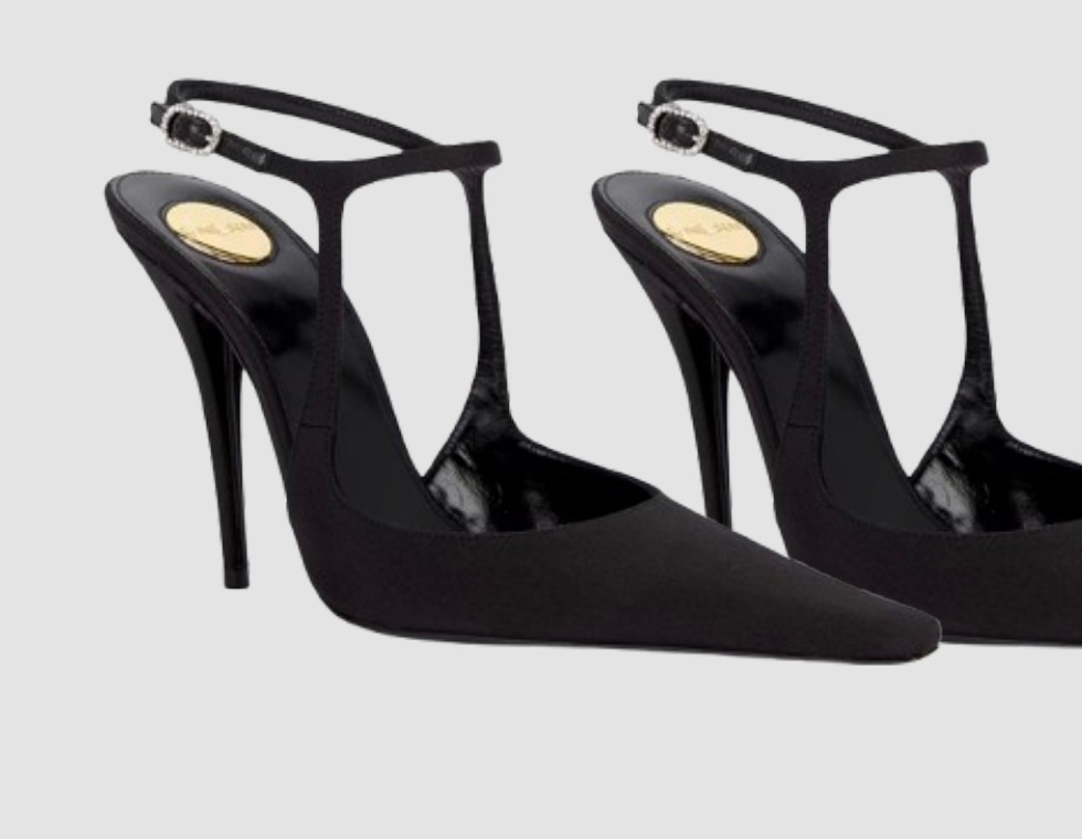 Black pointed slingback pumps